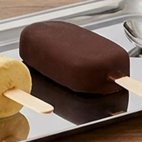 A chocolate-coated ice cream bar on a wooden stick